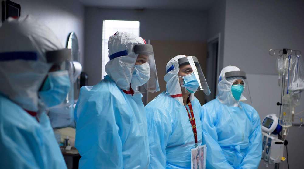 Skeptical US hospital workers choose dismissal over vaccine