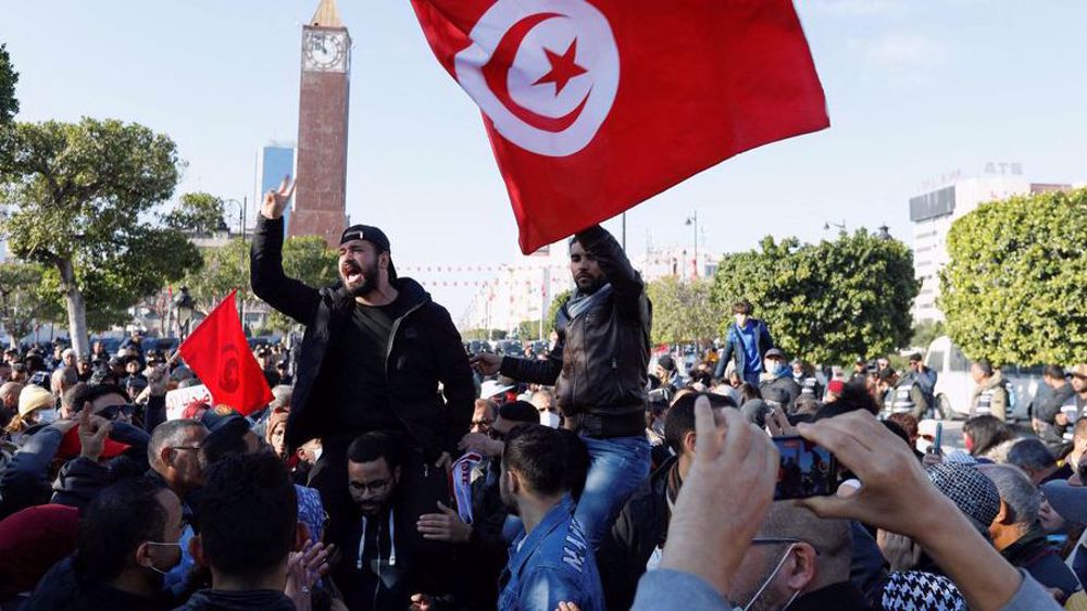 Tunisians call for ouster of president on anniversary of 2011 revolution