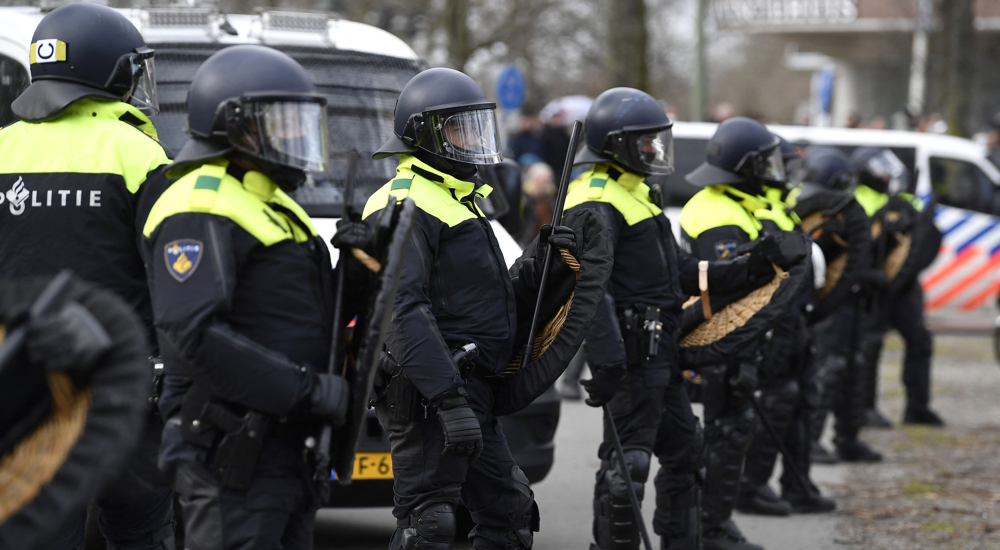 Dutch police use water cannon to clear anti-government protesters