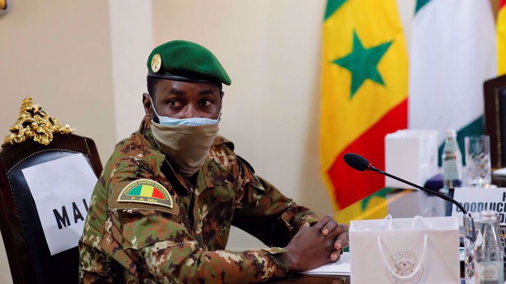 Mali coup leader Goita sworn in as interim president