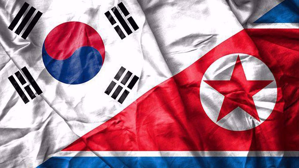 North, South Korea restore severed hotline