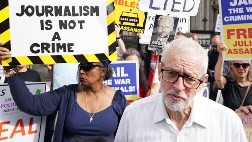 Jeremy Corbyn leads protest against Assange extradition to US 