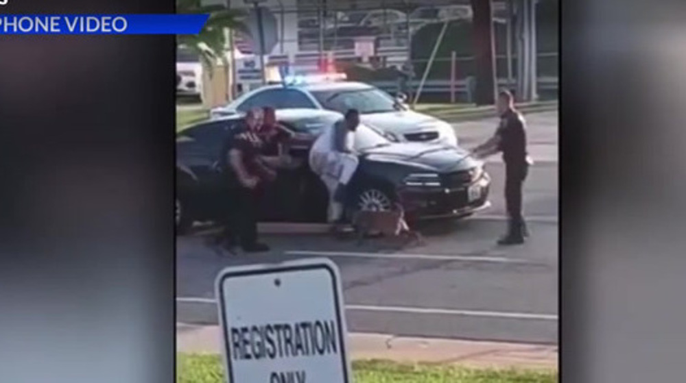 Video shows Missouri police letting dog maul black man