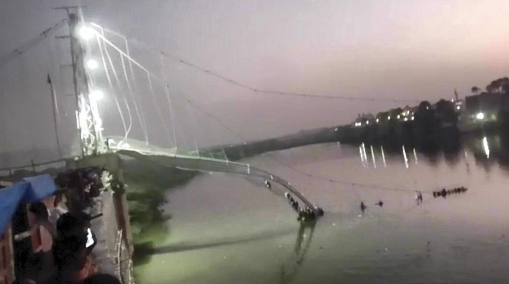 Over 80 people killed after suspension bridge collapses in India’s Gujarat