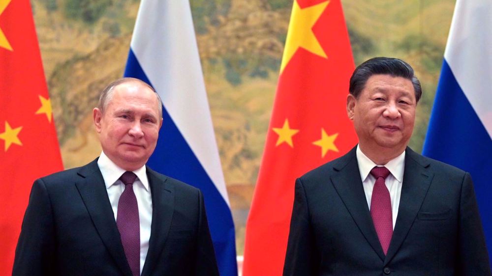 Analyst: Russia faces down American Empire, with China's backing 