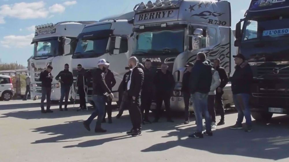 Truck drivers block highways in Italy in protest over soaring fuel prices