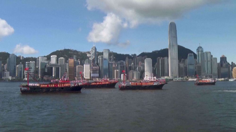 Boats parade in Hong Kong harbor ahead of 25th handover anniversary 