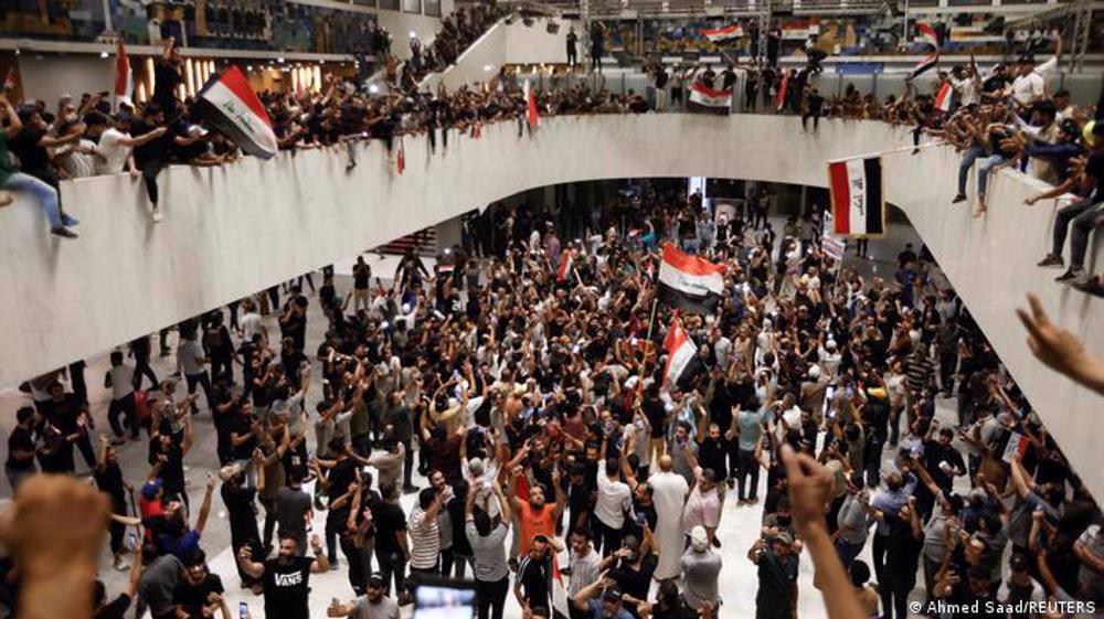 Sadr supporters storm Iraqi parliament to protest PM choice 