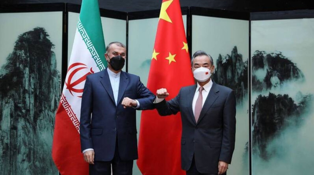 China backs Iran's 'reasonable demands' as FMs hold talks 