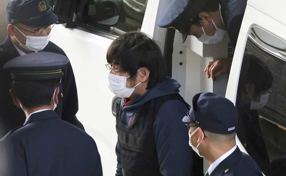 Suspect in assassination of ex-Japanese PM charged with murder 