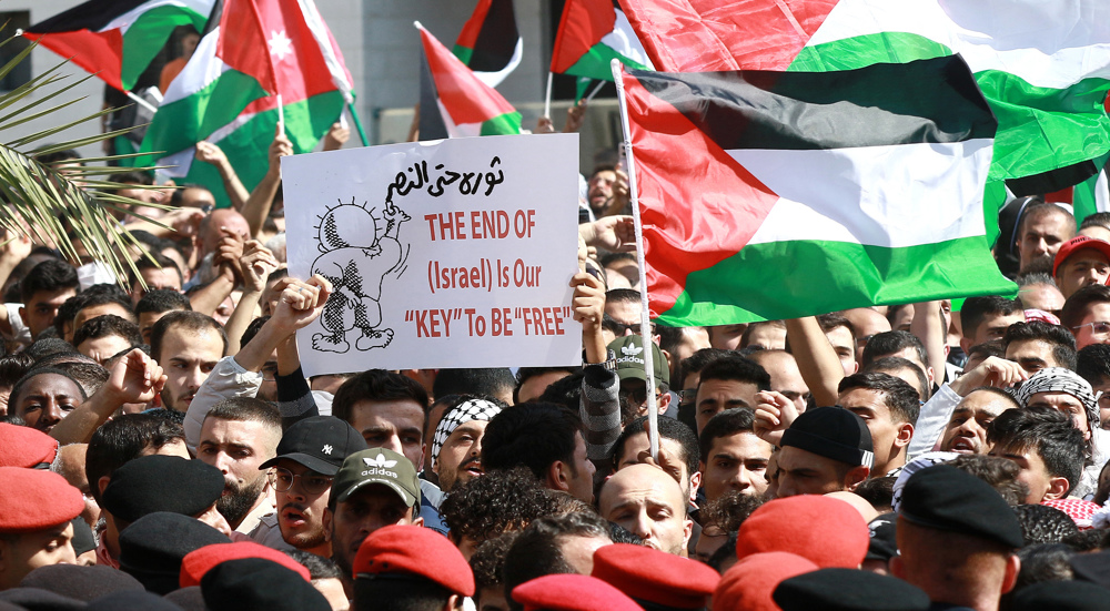 Jordanians rally in support of Palestinians, attack Israeli embassy 