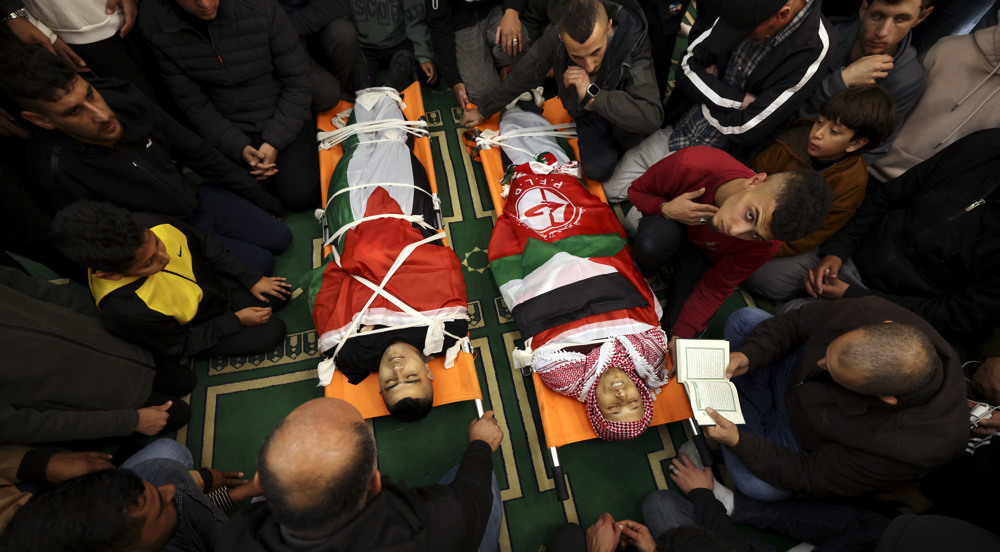 Hundreds attend funeral of two Palestinians killed in Israeli raid on West Bank camp 