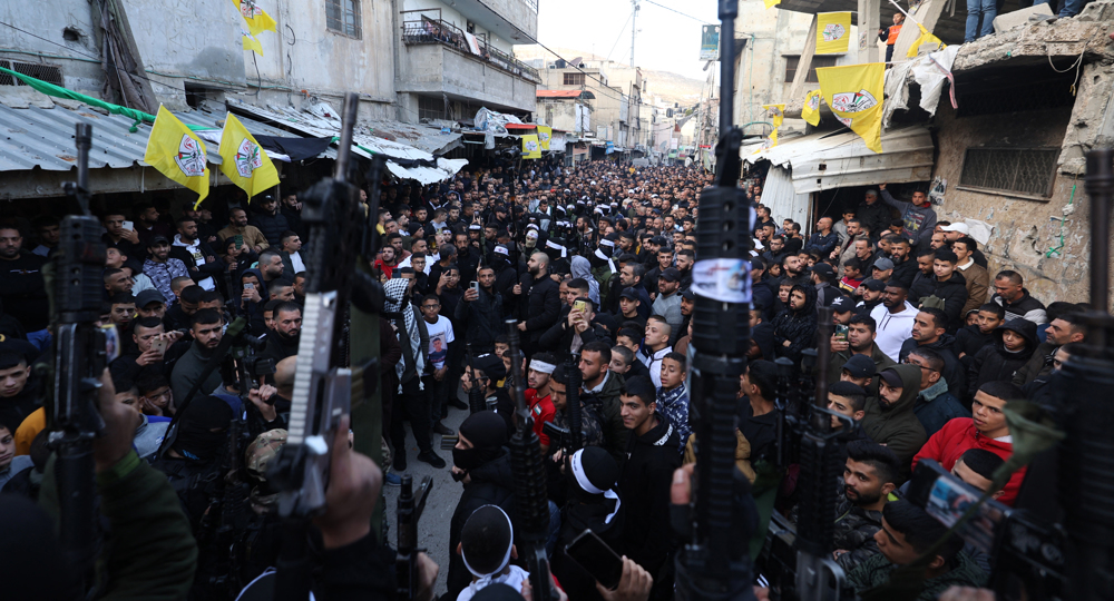 Palestinian resistance forces parade in Balata refugee camp