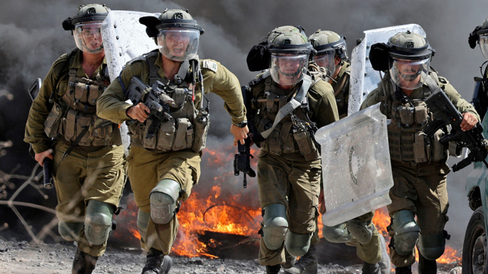 Israeli forces detain over a dozen Palestinians in multiple raids 