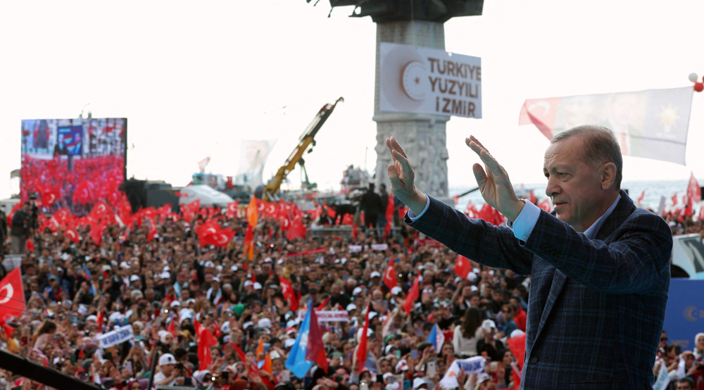 Turkey’s Erdogan blasts main rival as he returns to election trail
