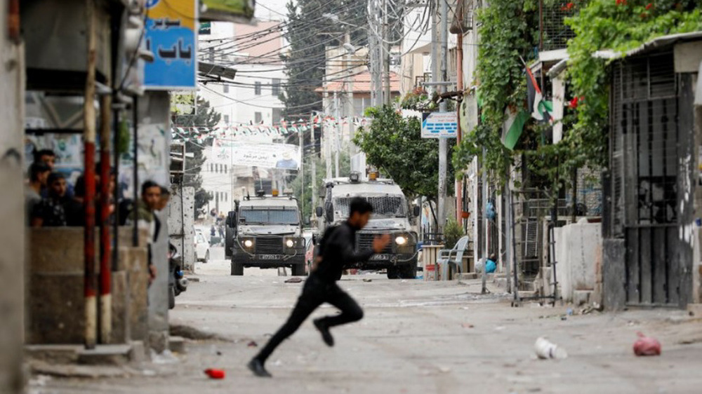 Five Palestinians wounded after Israeli forces raid camp in West Bank