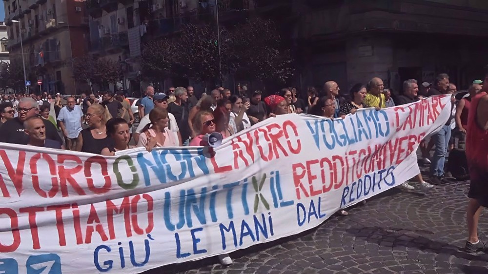 Demonstrators march in Naples as Meloni govt. ends welfare benefit