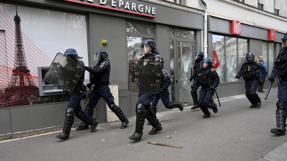 Tensions erupt at Paris anti-police violence protest