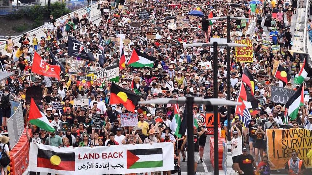 Thousands rally on 'Invasion Day' in Australia to support indigenous community 