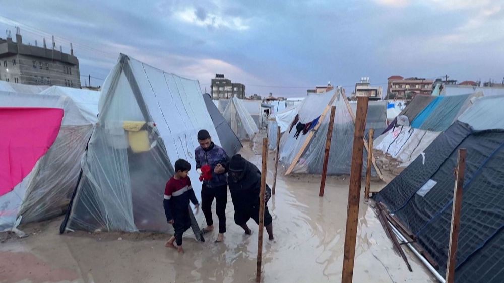 Tents for displaced Palestinians completely flooded by rain in Rafah