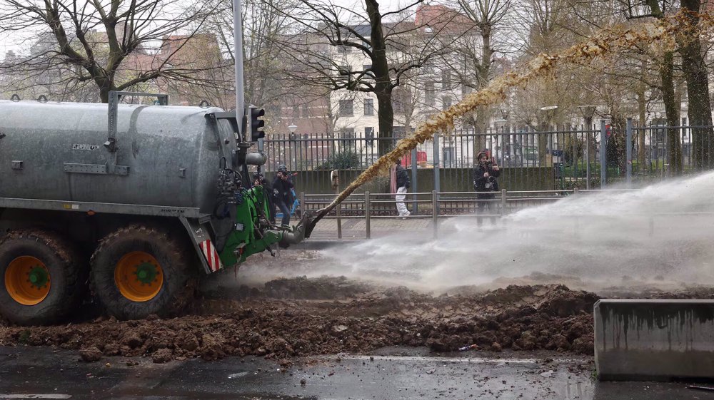 Belgian farmers clash with police during protests against EU's policies 