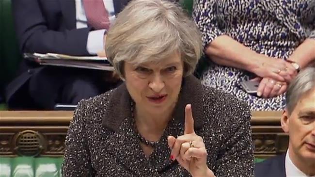 May hails 'defining moment' as UK leaves EU