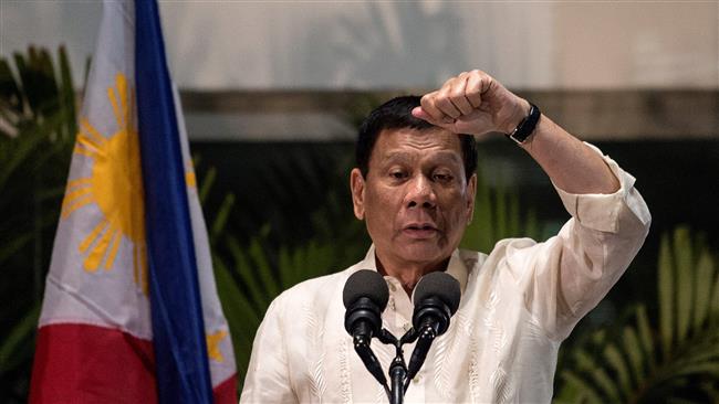 Philippine president sacks minister over corruption