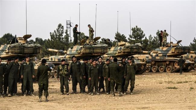 Turkey moves military vehicles to Syria border