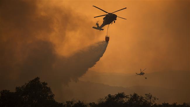 Strong winds pose fresh threat in California wildfires