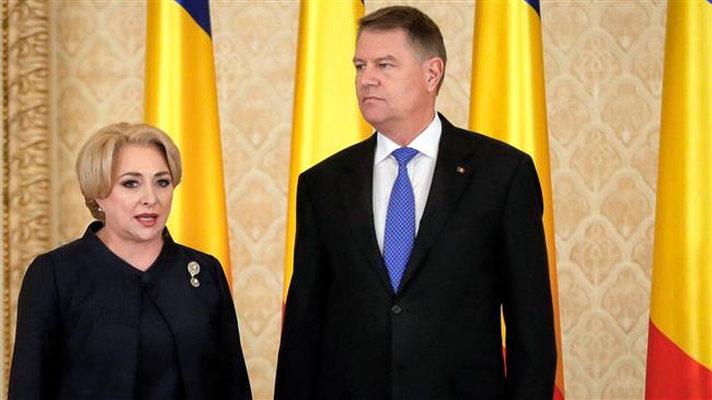 Romanian president urges PM to resign after Israel visit