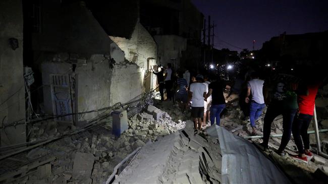 Ammo depot blast claims 18 lives in Baghdad 
