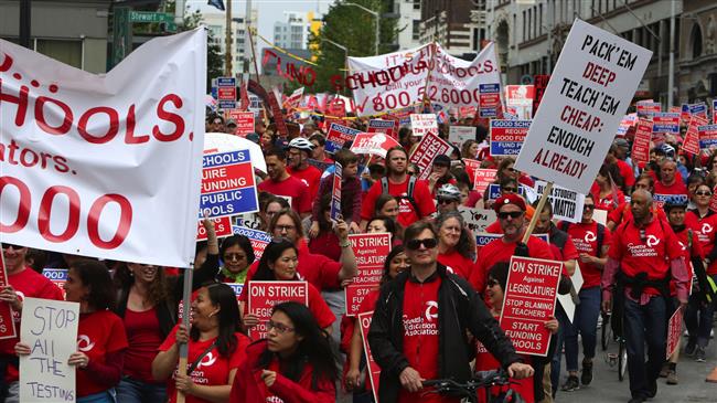 Thousands of teachers in US state strike over salaries