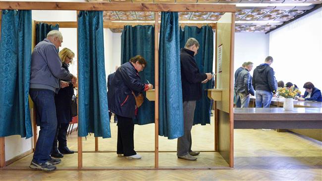 Pro-Russian favorite as polls open in Latvia election 