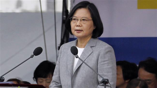 Defiant Taiwan flexes muscles amid China's warning
