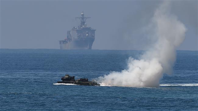 China has 'stern' words with US over warship intrusion