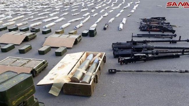 Syria uncovers new caches of arms made in US