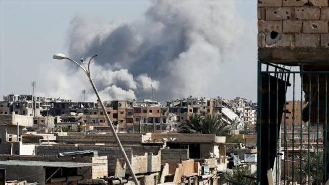 Over dozen Syrians killed in fresh US-led airstrikes