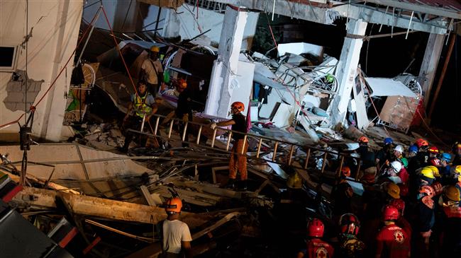 8 killed, dozens feared trapped after Philippines quake 