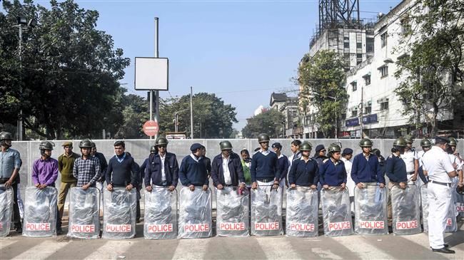 Indian police baton-charge anti-Modi protesters 