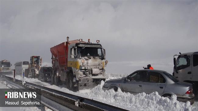 Iran vows to immediately open key road shut by snow