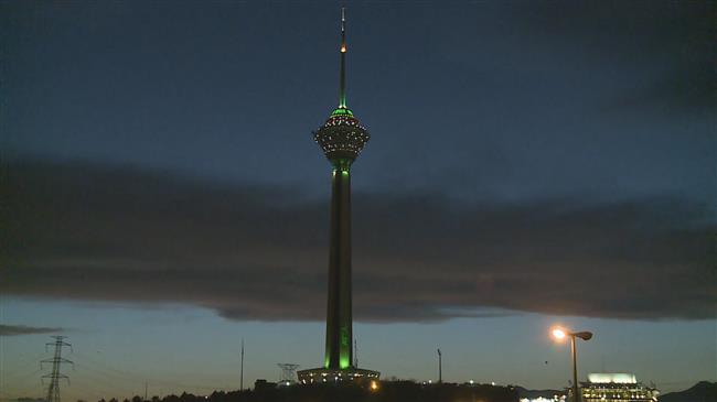 Tehran's Milad Tower goes green for health workers fighting COVID-19 