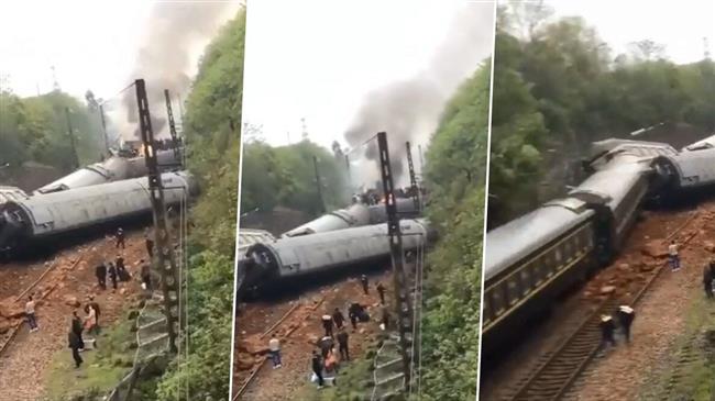 Chinese passenger train derailed by landslide debris 