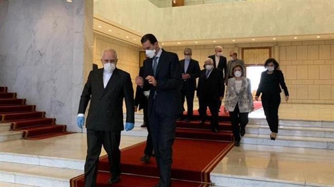 Iran FM Zarif meets with Syria's President Assad in Damascus