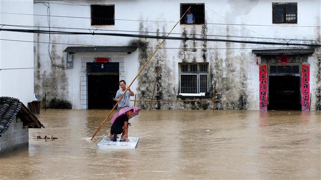 China raises flood alert to second highest level 