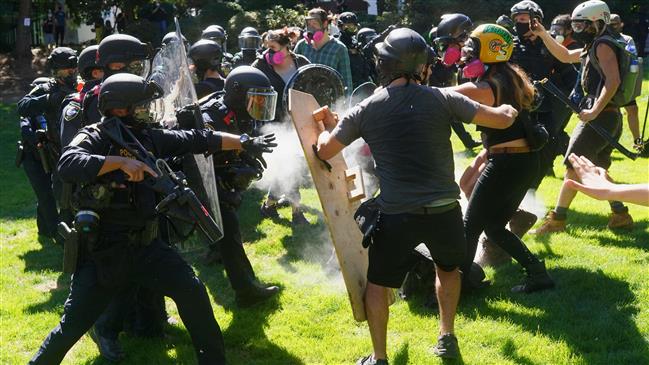 Right-wing groups clash with counter protesters in Portland