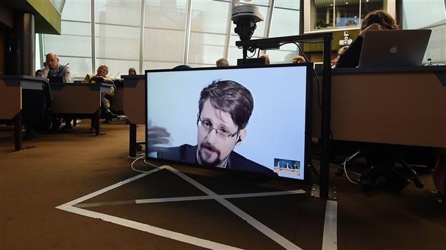 Russia grants whistleblower Snowden permanent residency rights 