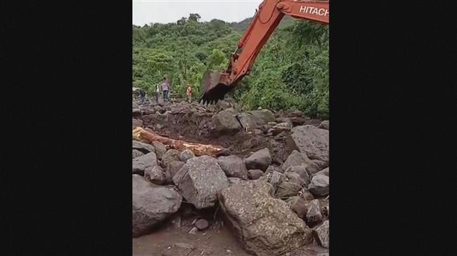 Landslide, volcanic rocks destroy houses after tropical cyclone hits Indonesia