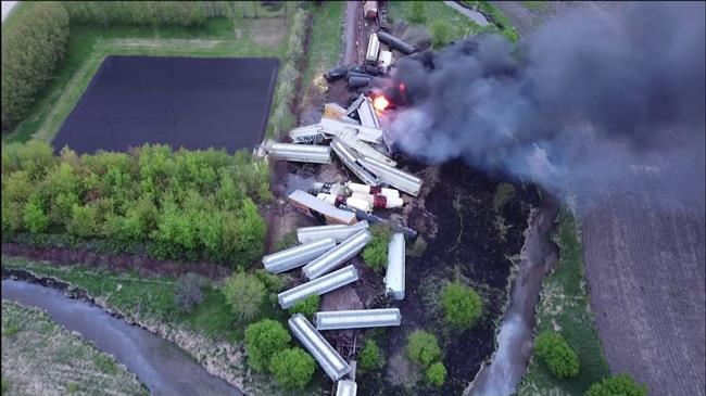 Drone footage shows fire, scale of massive train derailment in Iowa