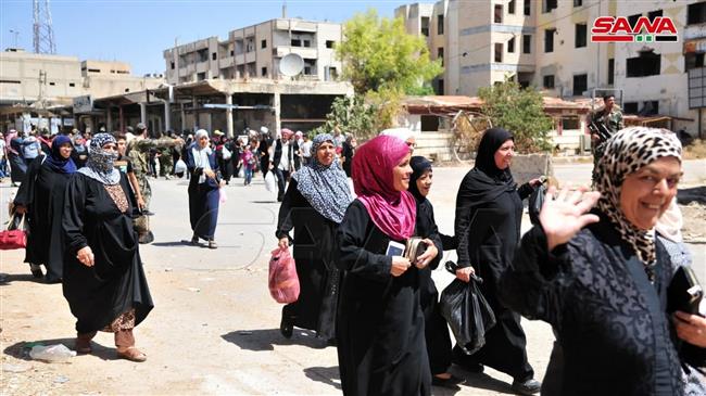 Thousands of Syrians return to homes after terrorists leave city
