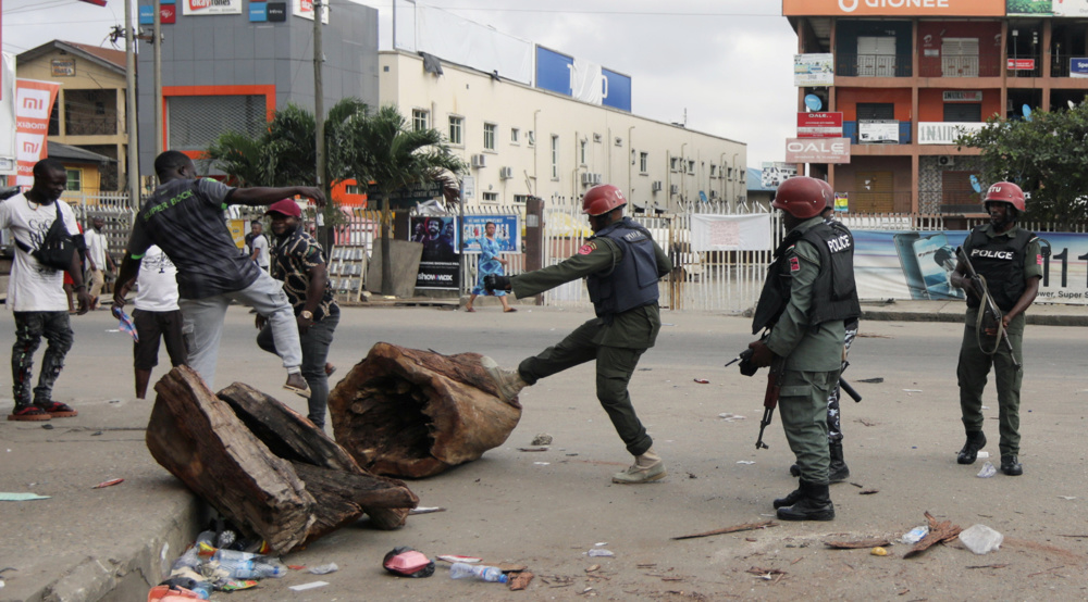 Nigeria unrest: Police deploy all forces to take back streets